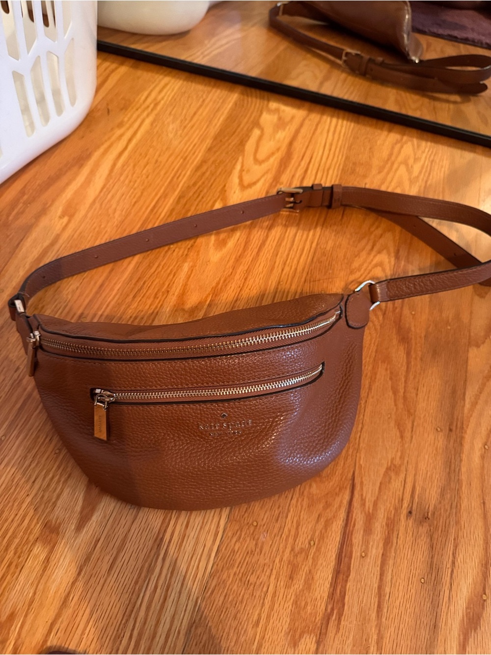 kate spade pebbled leather belt bag in warm gingerbread with gold hardware